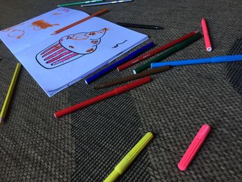 High angle view of books on table