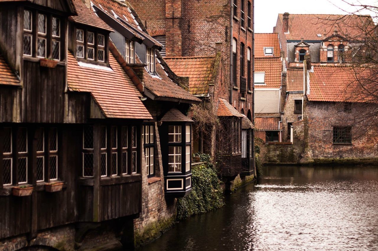 building exterior, architecture, built structure, water, residential structure, residential building, house, waterfront, canal, reflection, window, building, outdoors, city, town, day, no people, rippled, sky, residential district