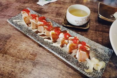 High angle view of sushi served on table