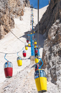 Multi colored umbrellas on rock