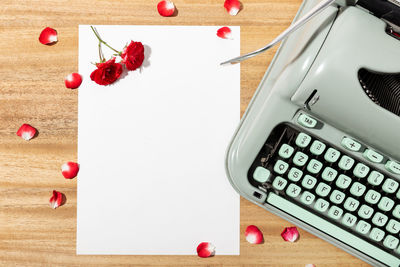 High angle view of text on paper at table