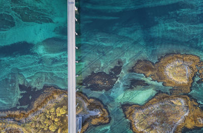 High angle view of rocks by swimming pool