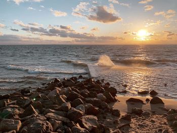 Scenic view of sea against sky during sunset