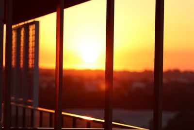 Sunset seen through glass window