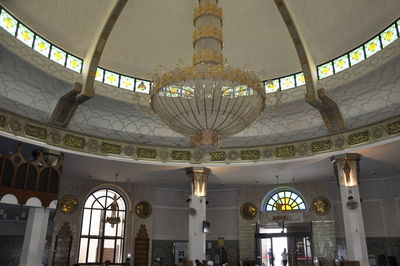 Low angle view of illuminated ceiling of building