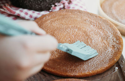 Close-up of hand holding bread