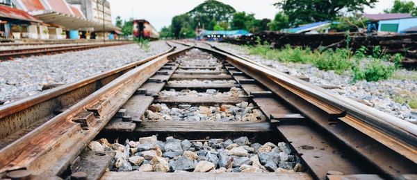 Surface level of railroad track against sky