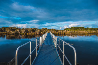 Scenic view of lake against blue sky