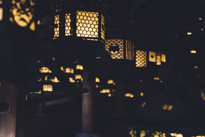 Low angle view of illuminated building at night