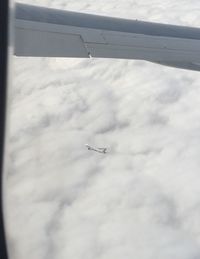 Airplane flying in sky
