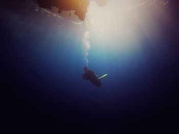 Person swimming in sea