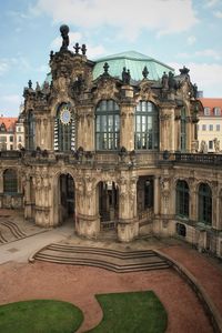 Facade of historic building against sky