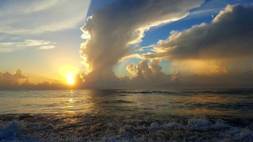 Scenic view of sea at sunset