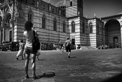 Man walking on street in city