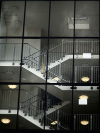 Low angle view of illuminated modern building