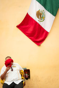 High angle view of man holding american flag