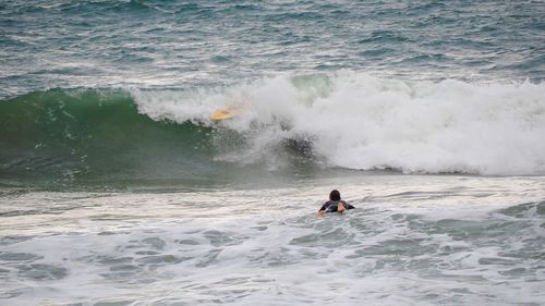 Man surfing in sea