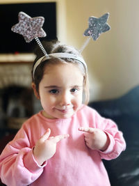 Portrait of cute girl with christmas decoration
