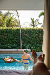 People photographing in swimming pool