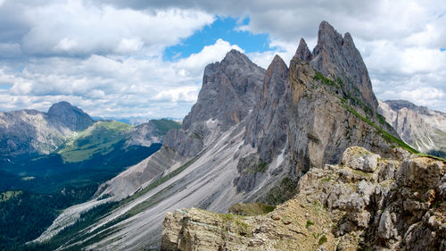 Mount seceda and west valleys in a beautiful summer morning, val gardena, dolomites, italy.