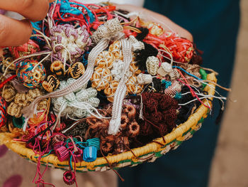 Cropped hand of person holing wool