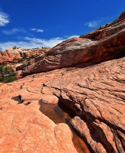 Rock formations on mountain against sky