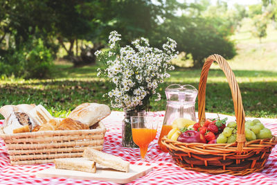 Close-up of fresh fruits in basket on table
