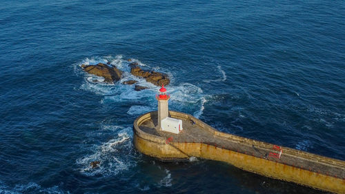 Aerial view of farolim de felgueiras lightouse in porto - portugal