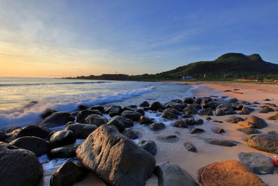 Scenic view of sea against sky during sunset