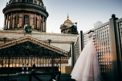 View of dress handing against building