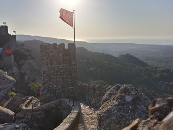 Flag at fort against sky