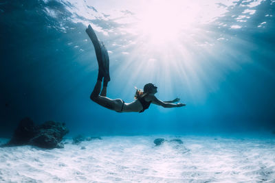 Man swimming in sea