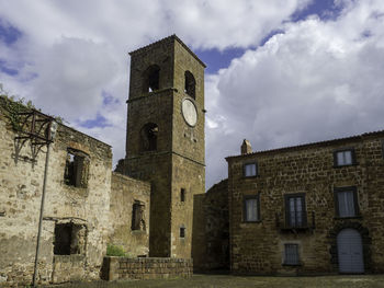 Low angle view of old building against sky