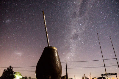 Traditional calabash gourd sculpture against star field