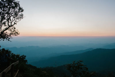 Scenic view of mountains against sky during sunset