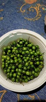 High angle view of fruits in bowl on table