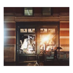 View of illuminated building in restaurant