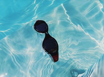 High angle view of swimming in pool