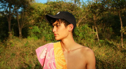 Portrait of young woman standing on a costa rican beach