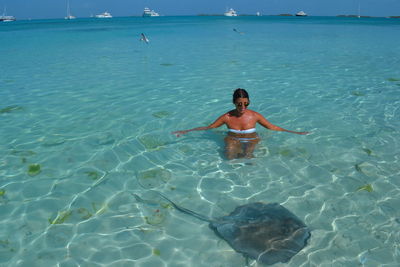 Woman swimming in sea