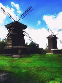 Low angle view of windmill against clear sky