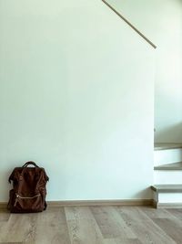 Wooden table against wall at home