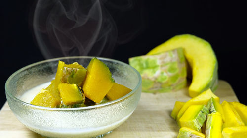 Close-up of fruits in bowl on table