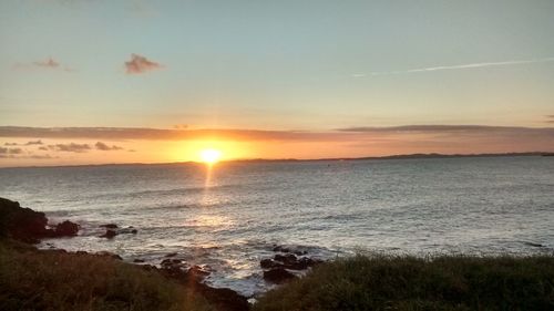 Scenic view of sea during sunset