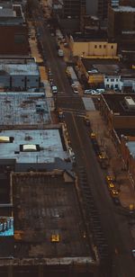 High angle view of traffic on road amidst buildings