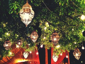 Low angle view of illuminated lamp post