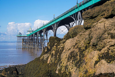 Bridge over sea against sky