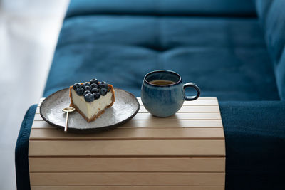 Close-up of coffee cup on table