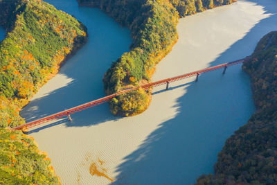 High angle view of river amidst mountains