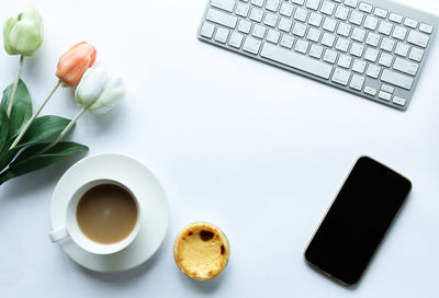 High angle view of coffee cup on table